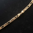 14kt Gold Figaro Link Chain - Flat Lay