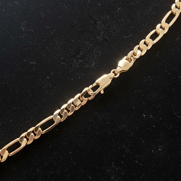 14kt Gold Figaro Link Chain - Flat Lay