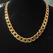 18ct Gold 12mm Link Chain - Flat lay
