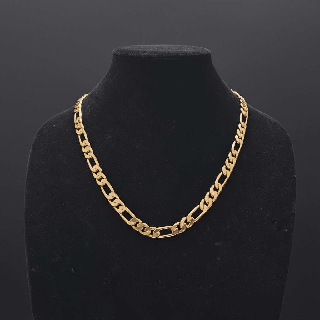 18ct Gold 24 61cm 10mm 3:1 Figaro Chain displayed on black bust for jewelry showcase.