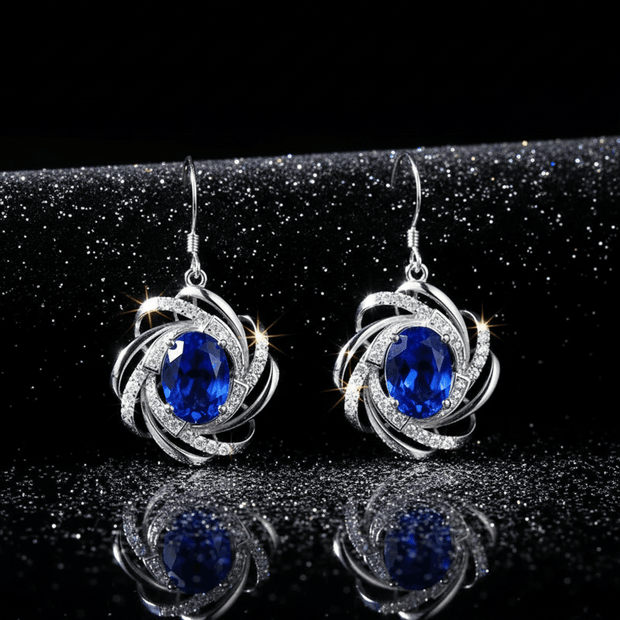 9ct White Gold Blue Cubic Zirconia Earrings - DP Online