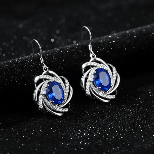 9ct White Gold Blue Cubic Zirconia Earrings - DP Online