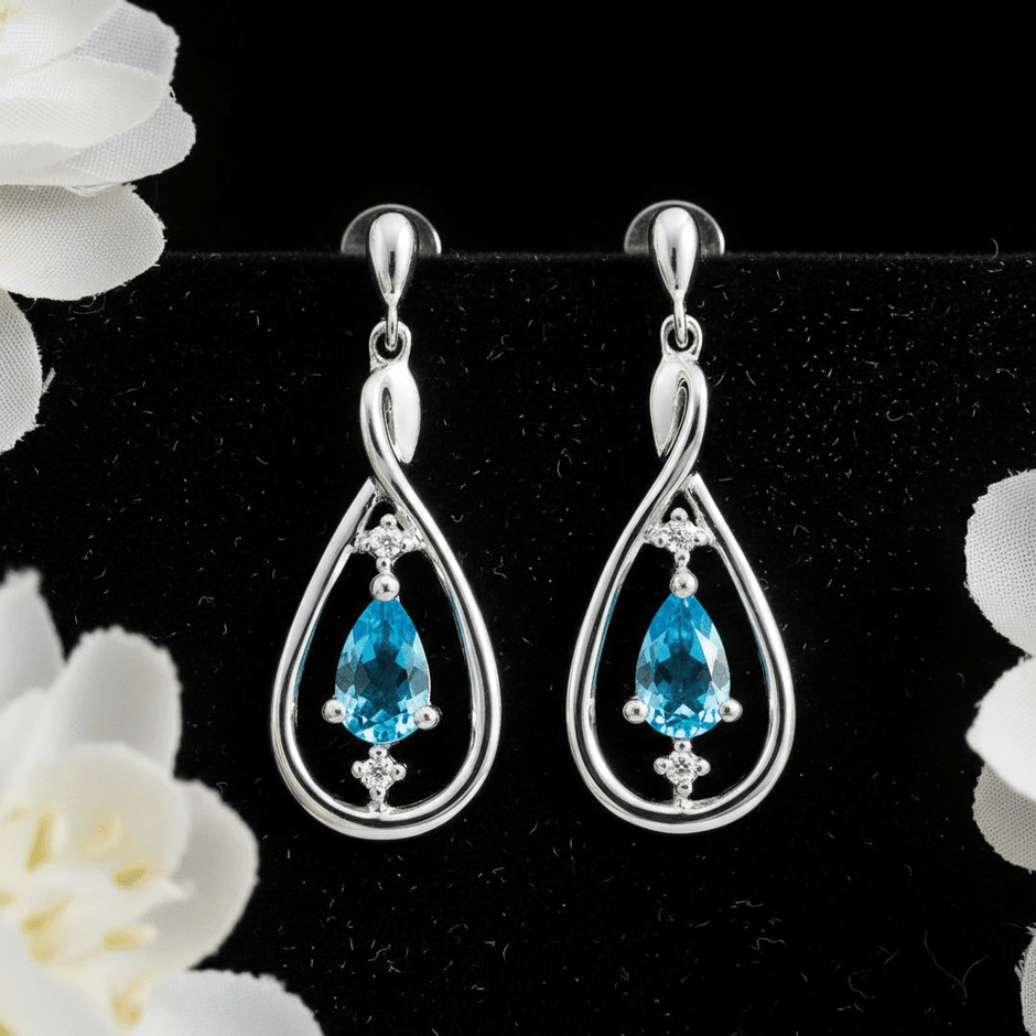 9ct White Gold Pear Cut Blue Topaz & Diamond Set Drop Earrings - DP Online
