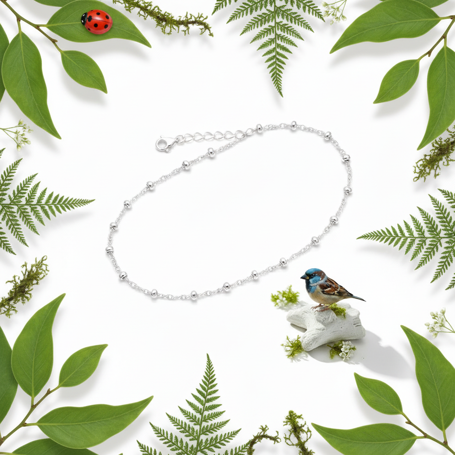 Anklet with bird and greenery