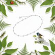 Anklet with bird and greenery