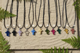 Colliers avec pendentif croix en cristal