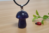 Dark Amethyst Mushroom Pendant – Wooden Surface