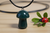 Dark Green Aventurine Mushroom Pendant – Wooden Surface
