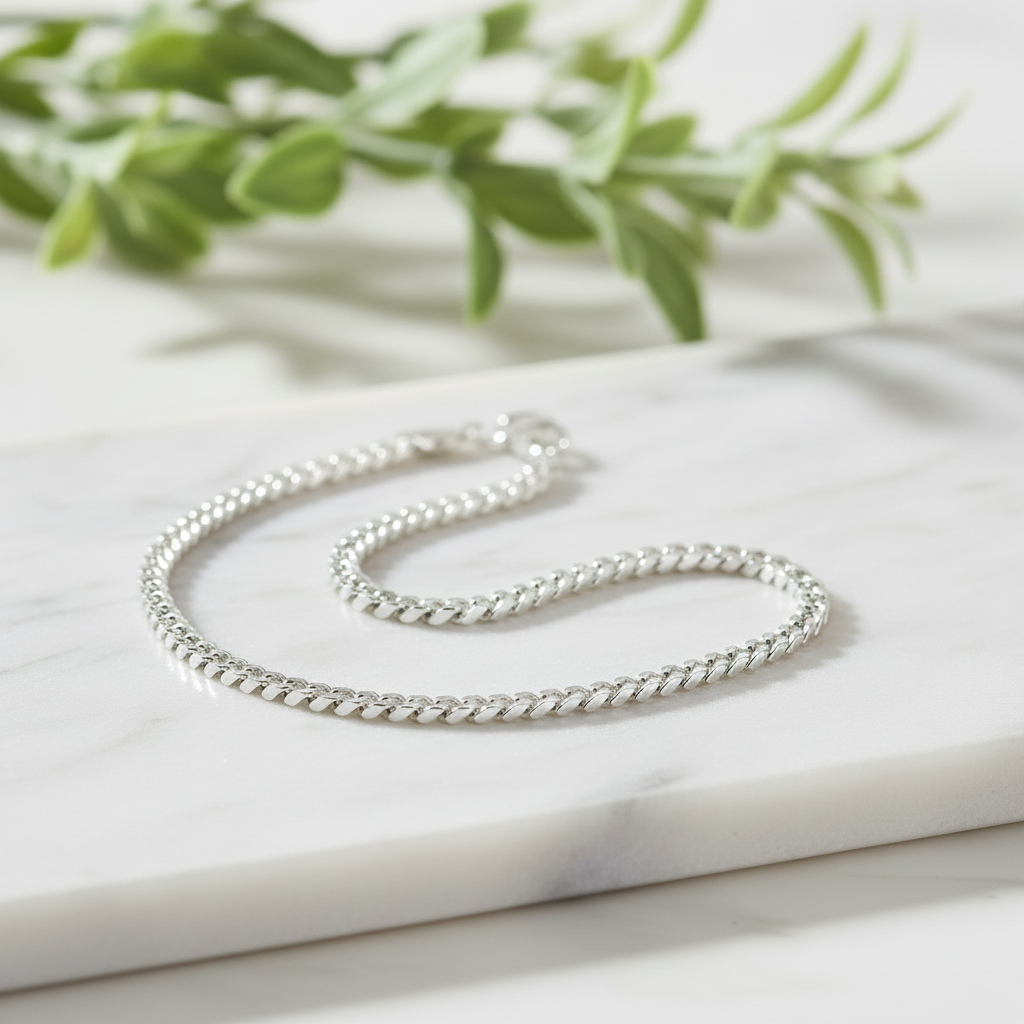 Detailed sparkling silver bracelet on marble
