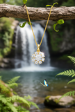 Diamond pendant with greenery and butterfly