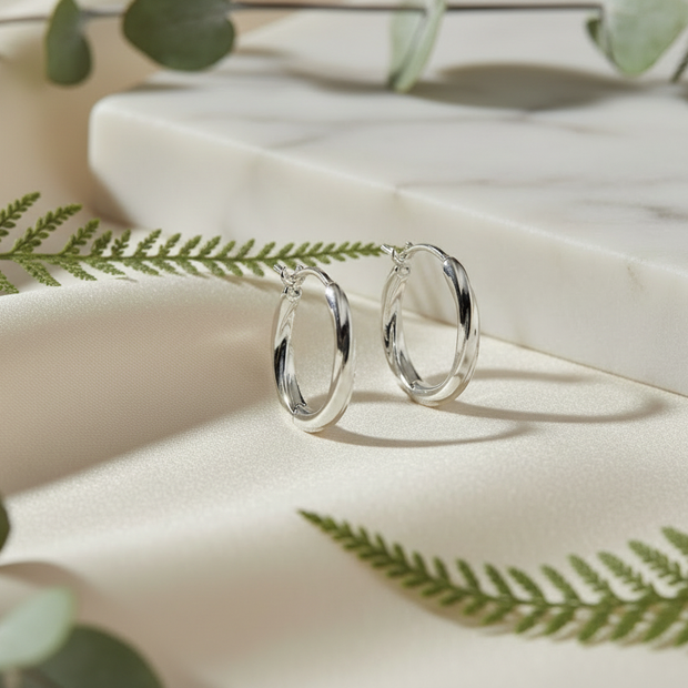 Elegant earring background with greenery