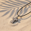 Fifth cross pendant close-up - hematite