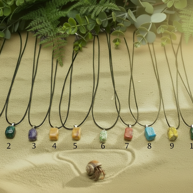 Gemstone pendants uniform size with hermit crab
