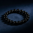 Glossy Black Bracelet Angled on Navy Velvet