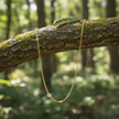 Gold curb chain with small lizard