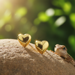 Gold Heart Earrings Angled Left to Right with Lizard