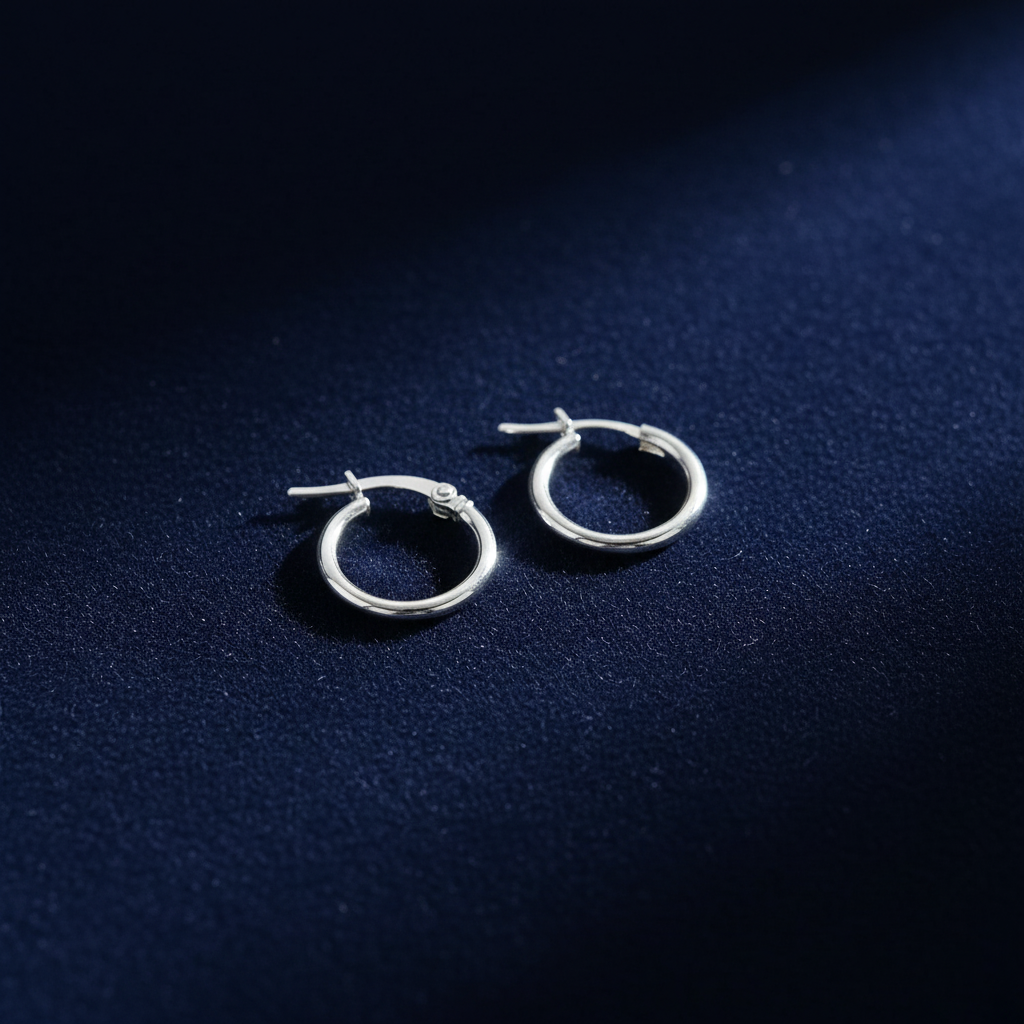 9ct yellow gold plain polished 10mm hoop earrings on black velvet