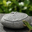 Infinity Bracelet on Rock with Lizard