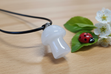 Milky Quartz Mushroom Pendant – Wooden Surface