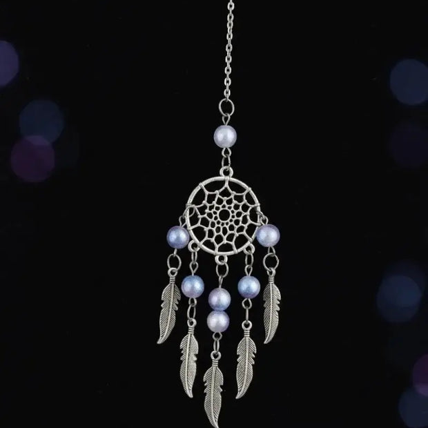 mystic dream catcher with aurora beads featuring silver web, iridescent beads, and feather charms.