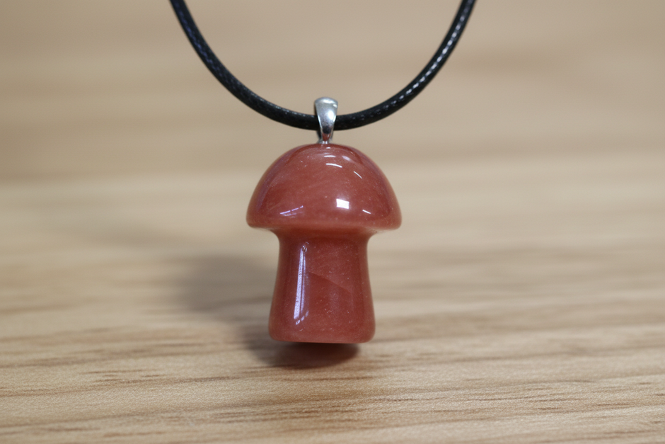 Peach Aventurine Mushroom Pendant – Wooden Surface