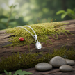 Pear Cubic Zirconia Pendant with Ladybug on Wood