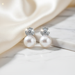 Pearl and CZ Cluster Earrings on Elegant Background