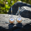 Pearl Earrings Vibrant on Dark Rock