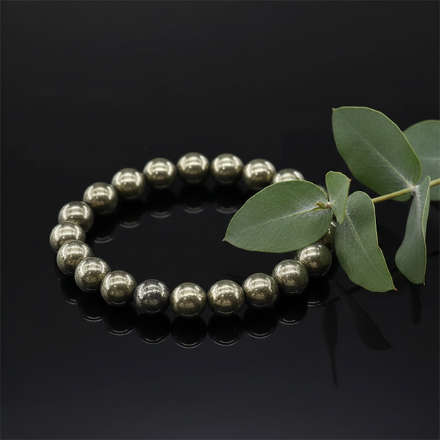 Pyrite angled with greenery