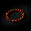 Red Tiger's Eye Angled on Black Velvet