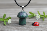 Ruby Zoisite Mushroom Pendant – Wooden Surface