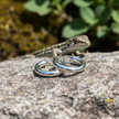 Silver hoop earrings with realistic sparkle