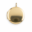 Smooth gold locket on white