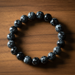 Snowflake Obsidian on Walnut
