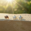 Star earrings with hermit crab