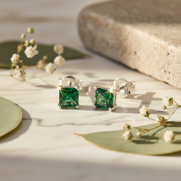 Sterling Silver Emerald Green Cubic Zirconia Stud Earrings Angled View