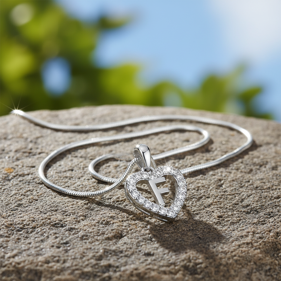 Sterling silver heart initial pendant with complete snake chain