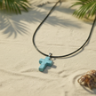 Turquoise Howlite cross close-up with chain