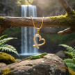 Two-tone heart pendant with lizard and waterfall