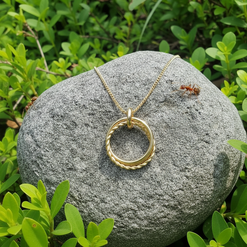 Vibrant gold necklace standing out with two bull ants